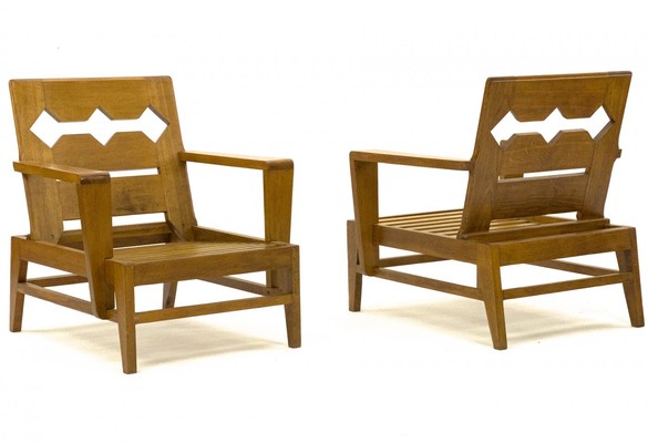 Rene Gabriel rarest unseen pair of carved oak lounge chairs