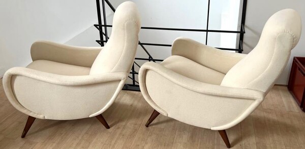 Slender superb pair of italian lounge chairs