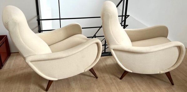 Slender superb pair of italian lounge chairs
