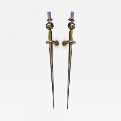 Spade shaped pair of awesome solid bronze sconces