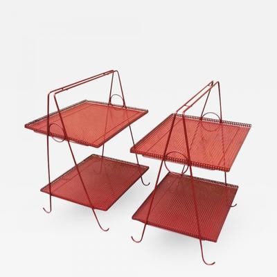 Style of Mathieu Matégot two tiers red perforated side table.