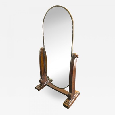 Sue et Mare documented carved and silvered standing mirror