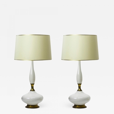 two white ceramic and gold bronze pair of table lamps