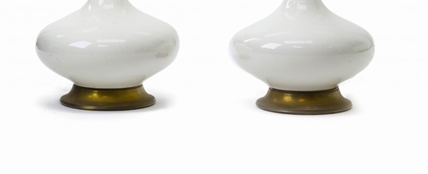 two white ceramic and gold bronze pair of table lamps